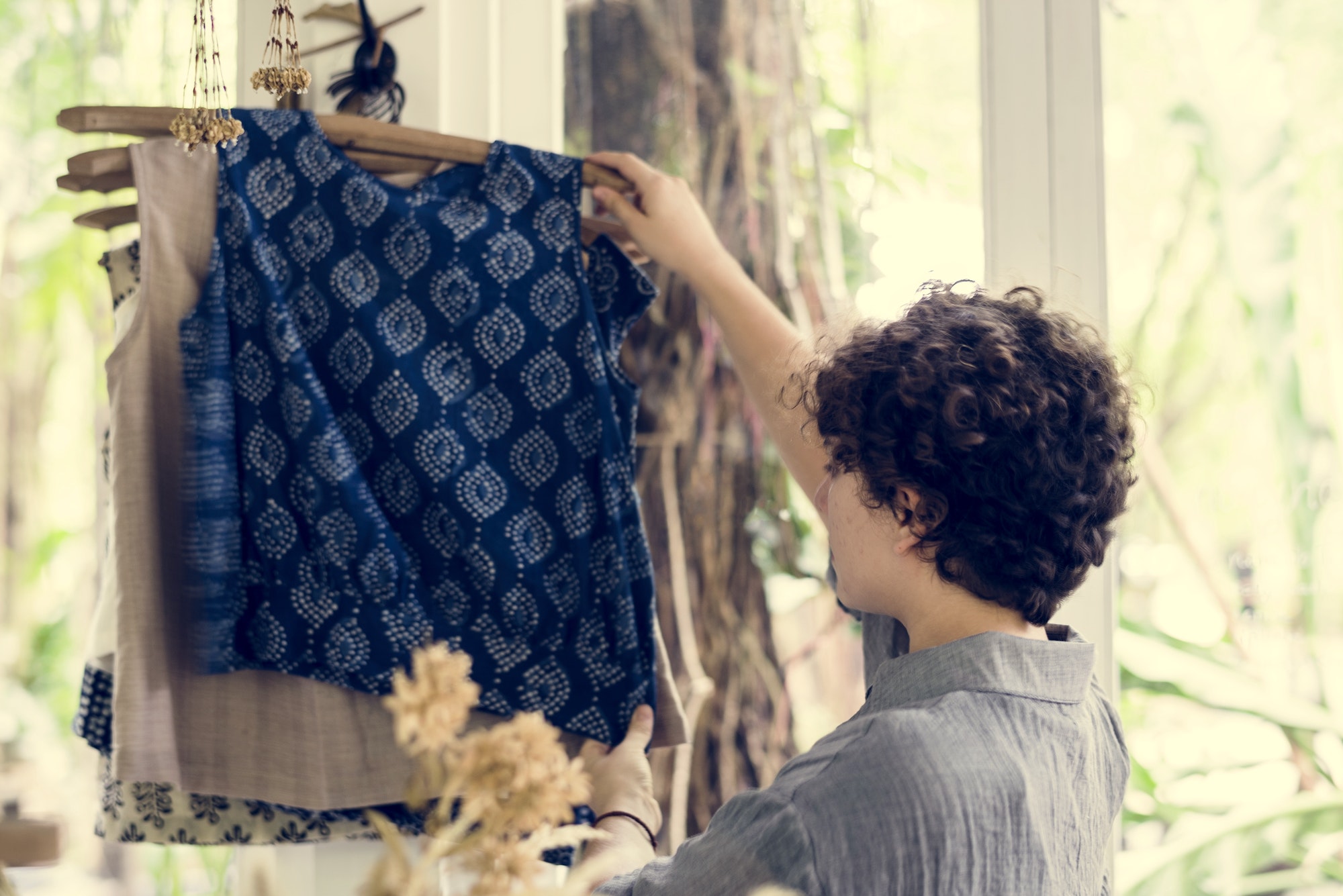 An entrepreneur woman in a clothe shop
