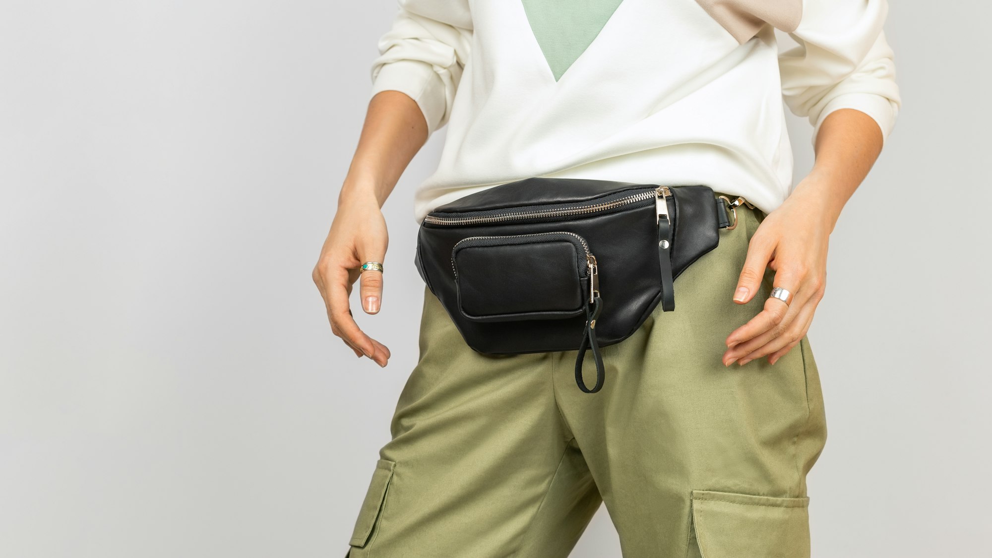Black Genuine Leather Belt Bag on a Woman